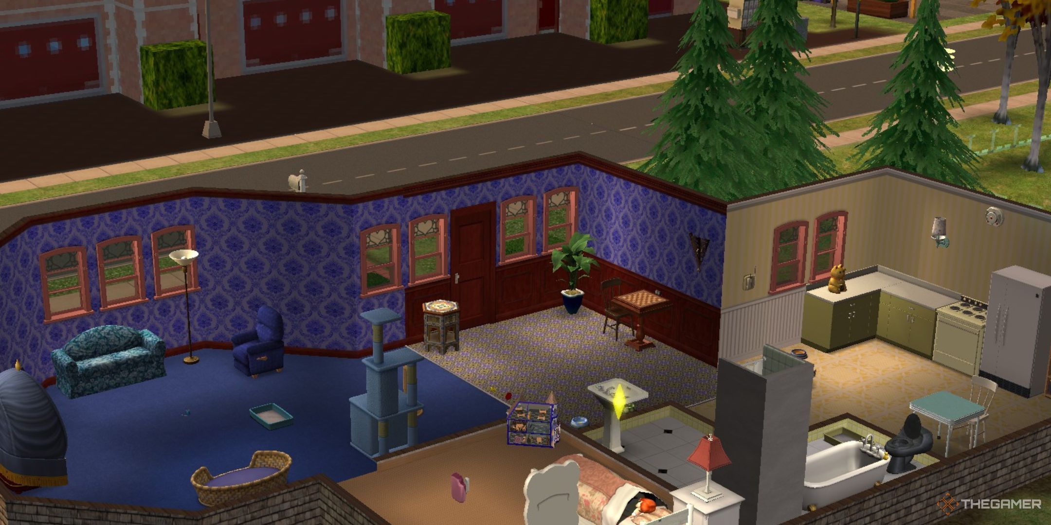 The Cozy Kittens Condo is shown in The Sims 2.