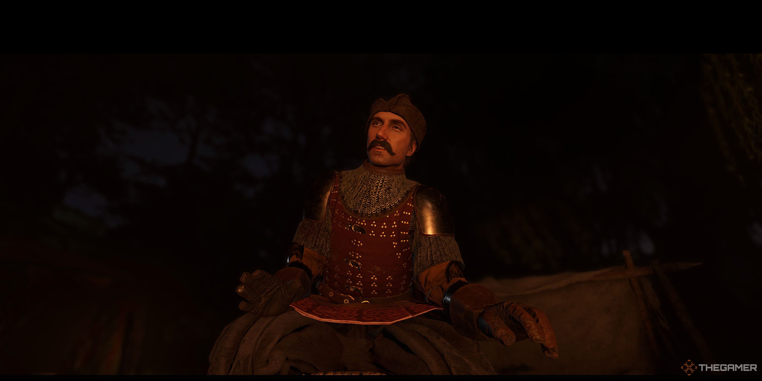 Vasko, one of the Cumans, is sitting during the night.