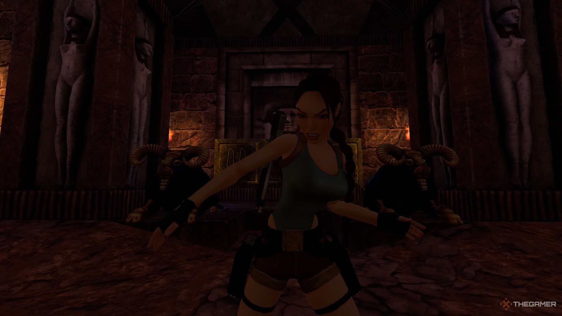 Lara Croft with two guardians behind her in Tomb Raider: The Last Revelation.