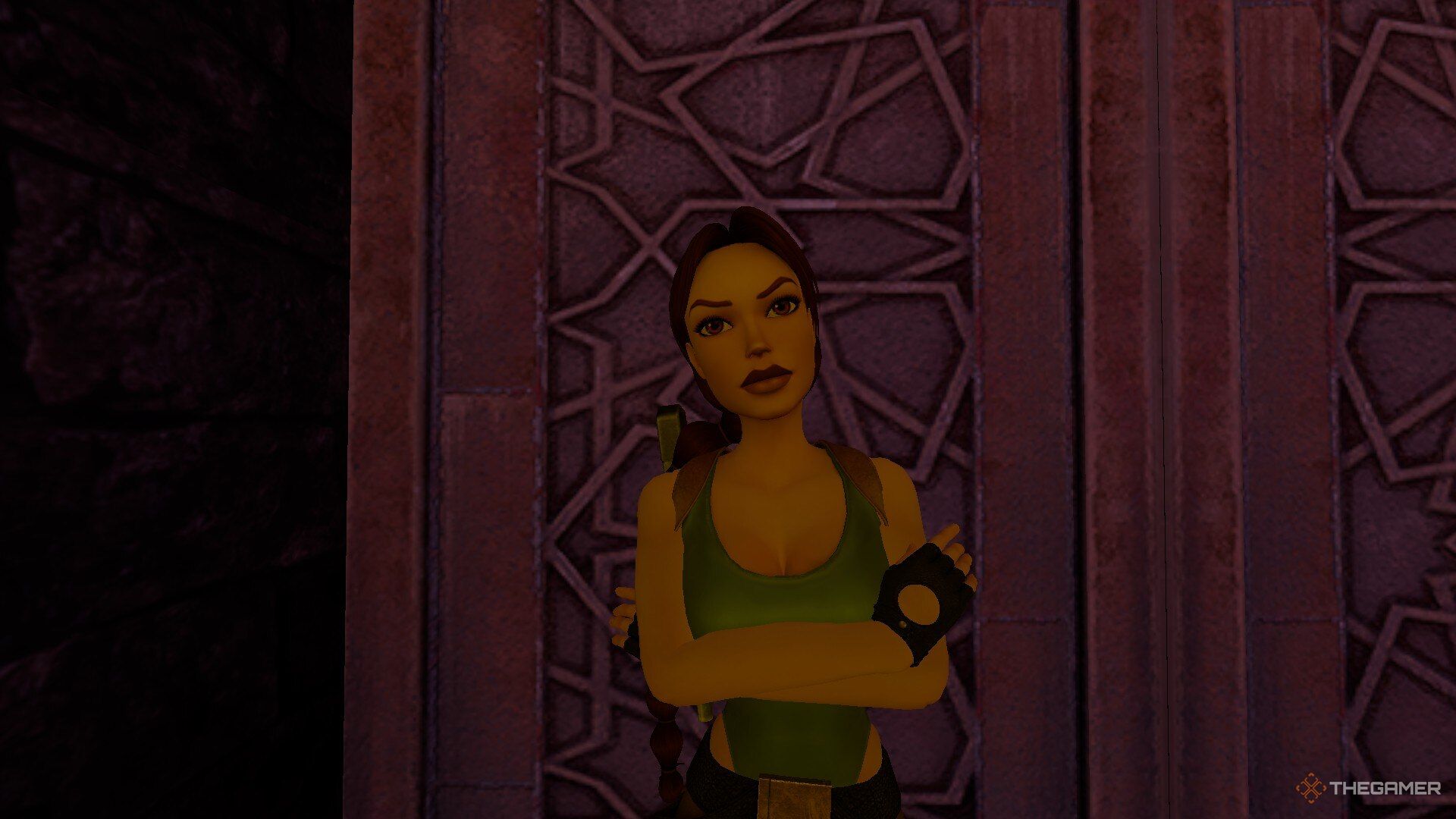 Lara with her arms crossed in Tomb Raider: The Last Revelation.