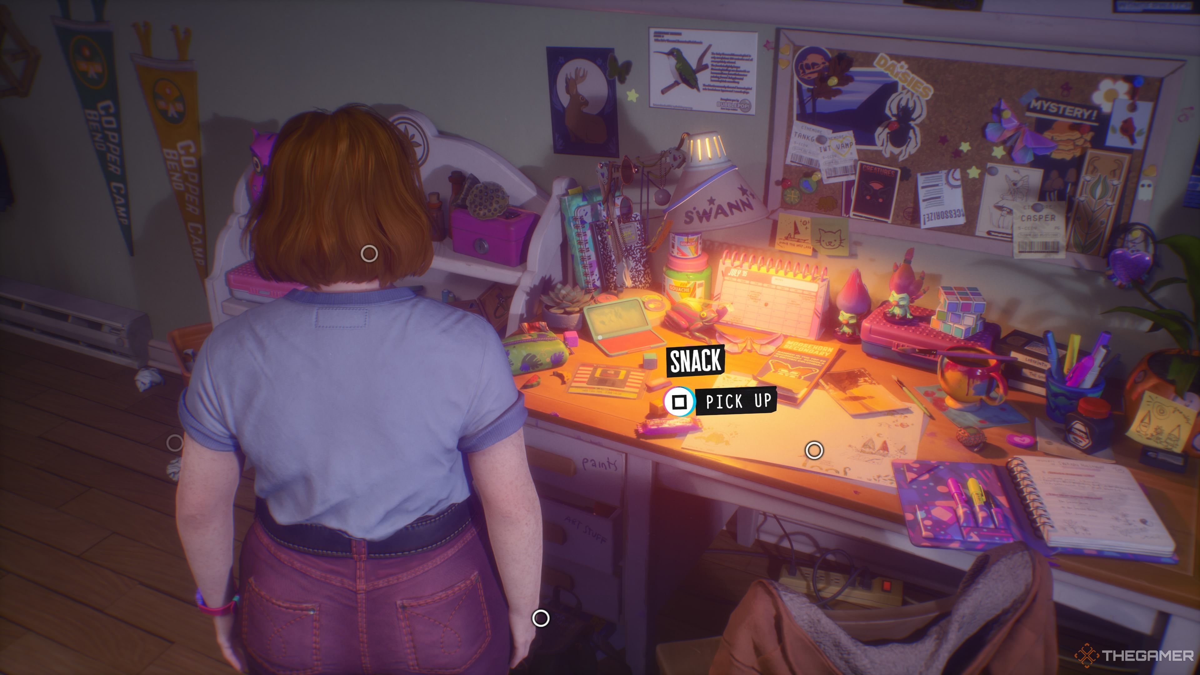 Swann looks at a snack on her desk in Lost Records: Bloom & Rage.