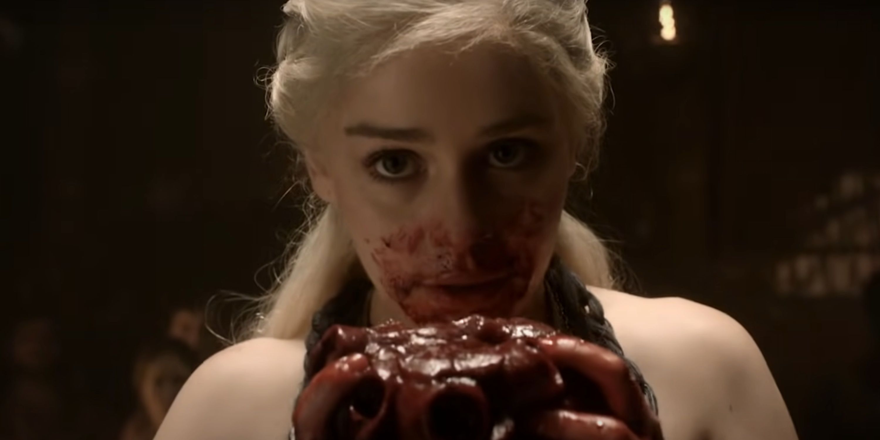 Daenerys eats a horse heart.