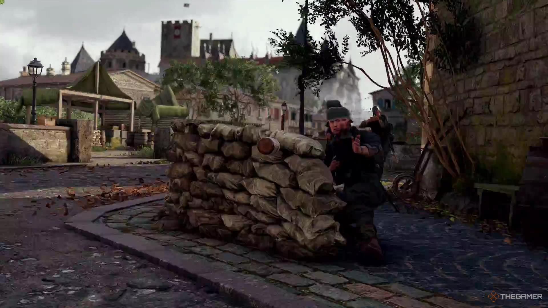 A bullet hurtles directly towards a Nazi in Sniper Elite Resistance.