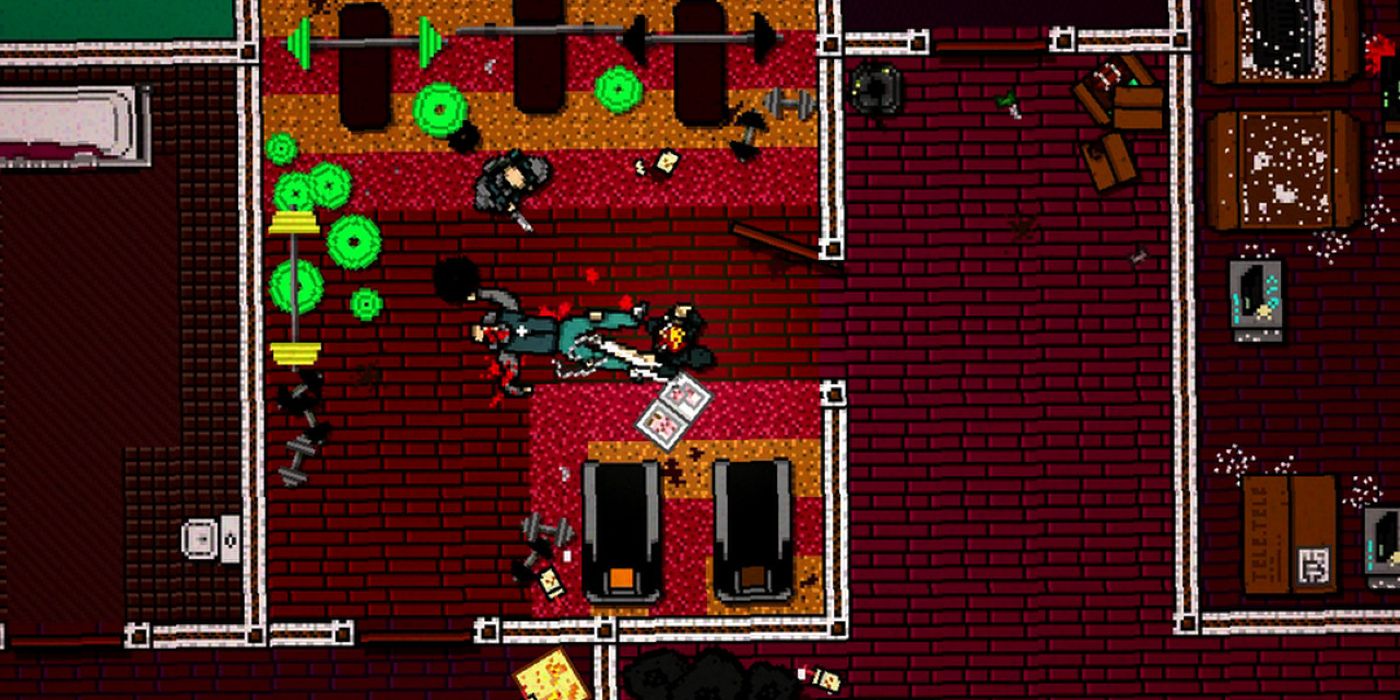 A screenshot from Hotline Miami 2, in which the main character stands over a dead body.