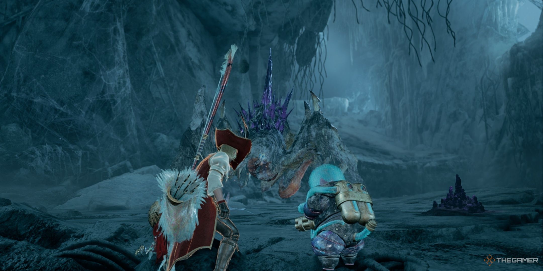 The hunter and their palico facing a nerscylla in the iceshard cliffs in monster hunter wilds.