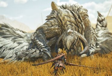 The hunter faces down The White Wraith, an Arkveld, in a grassy plain in Monster Hunter Wilds