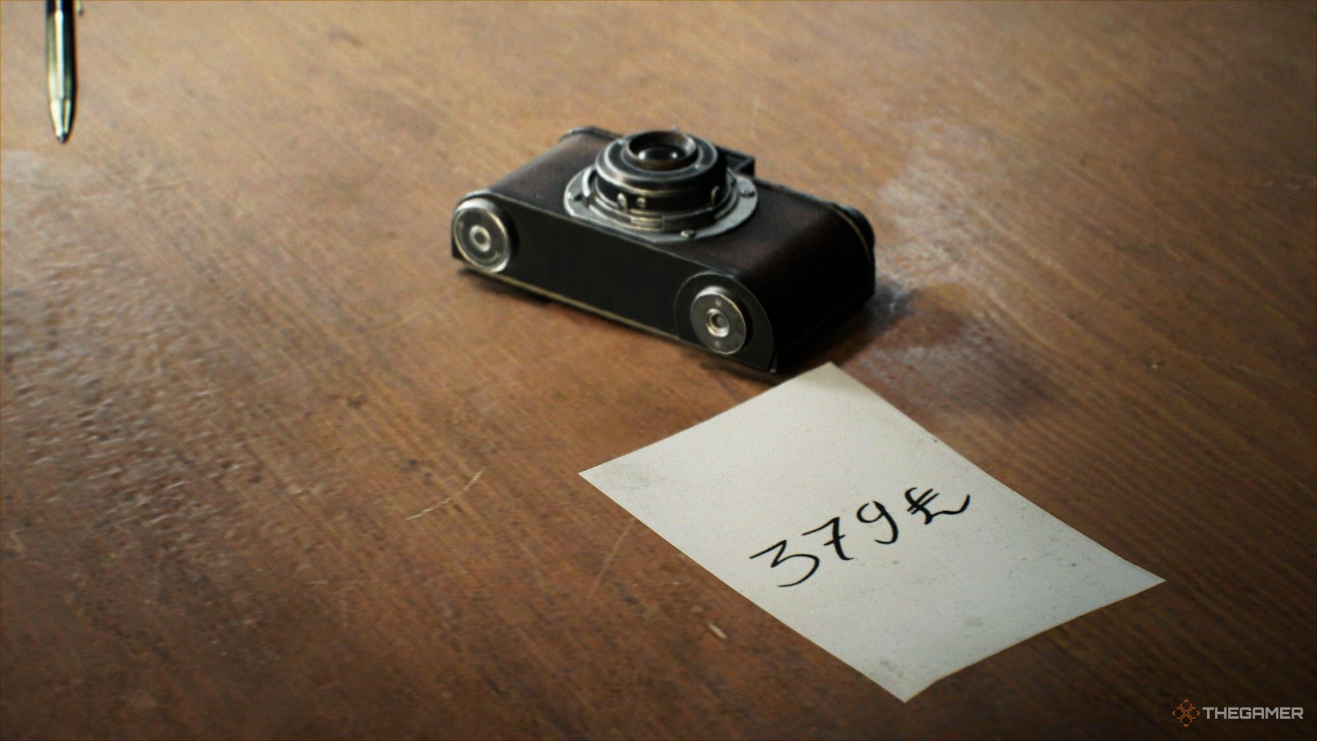 A camera is on the table with note that shows its price in Indiana Jones And The Giant Circle