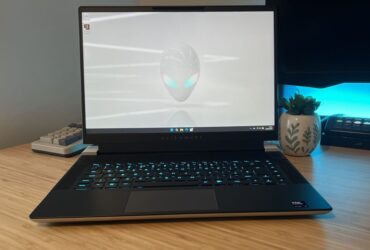 Alienware X16 R2 gaming laptop open on a wooden desk