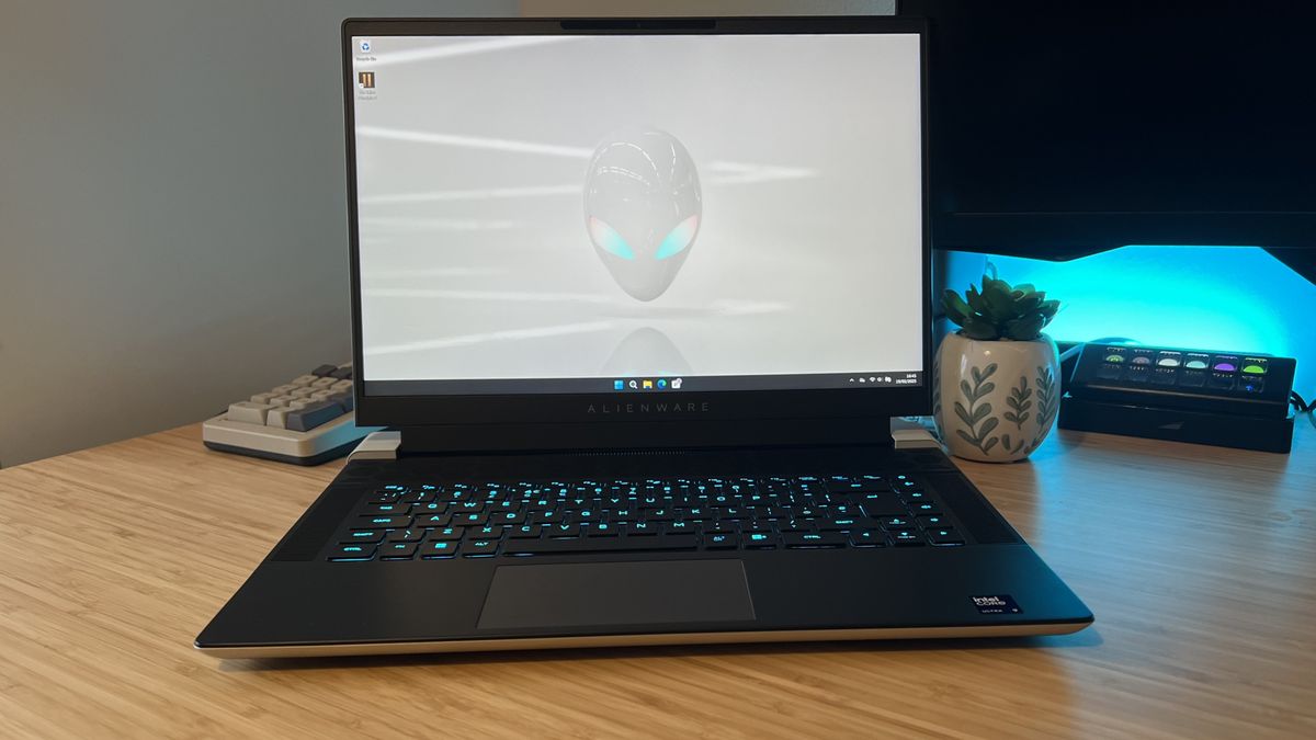 Alienware X16 R2 gaming laptop open on a wooden desk