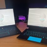 Alienware X16 R2 gaming laptop with Alienware M16 R2 on a wooden desk