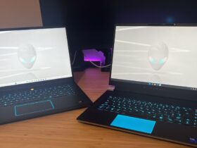 Alienware X16 R2 gaming laptop with Alienware M16 R2 on a wooden desk