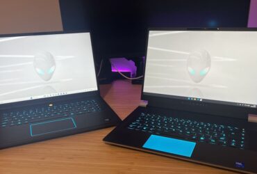 Alienware X16 R2 gaming laptop with Alienware M16 R2 on a wooden desk