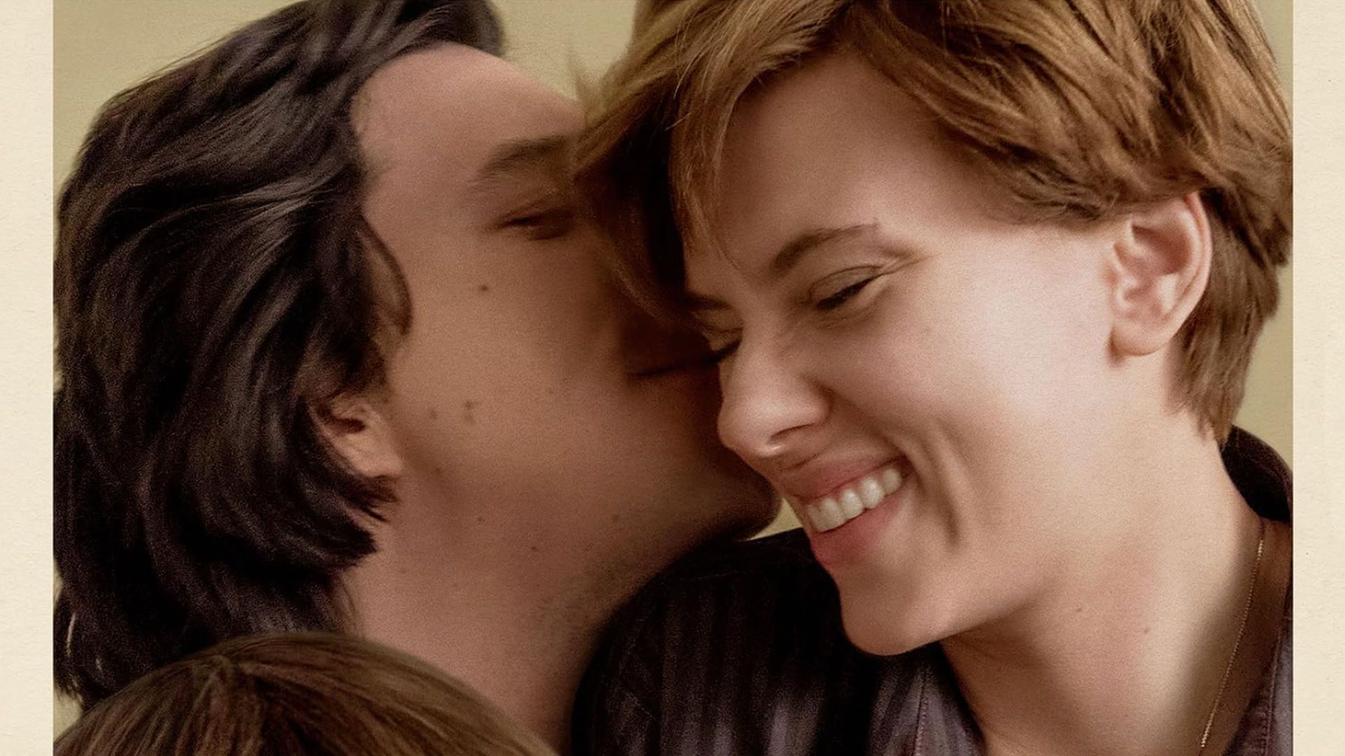 Poster of Adam Driver whispering in Scarlett Johansson's ear in Marriage Story.