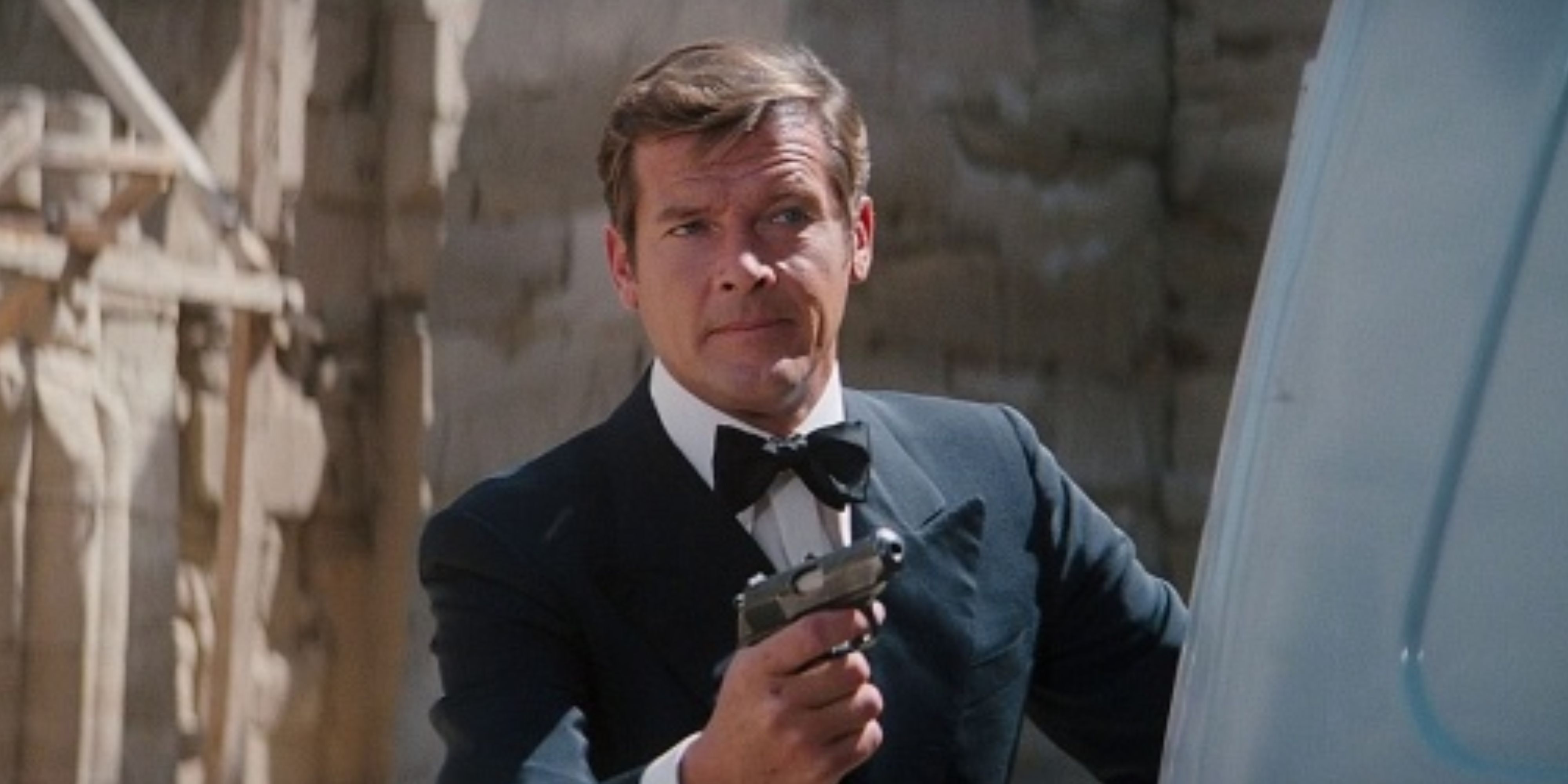 Roger Moore in James Bond with a pistol in The Spy Who Loved Me