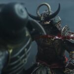 Yasuke swinging a sword at an enemy and splattering blood during the trailer for Assassin's Creed Shadows.