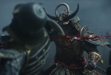 Yasuke swinging a sword at an enemy and splattering blood during the trailer for Assassin's Creed Shadows.