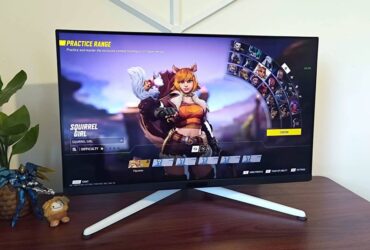 BenQ Mobiuz EX321UX monitor with Marvel Rivals Squirrel Girl on screen