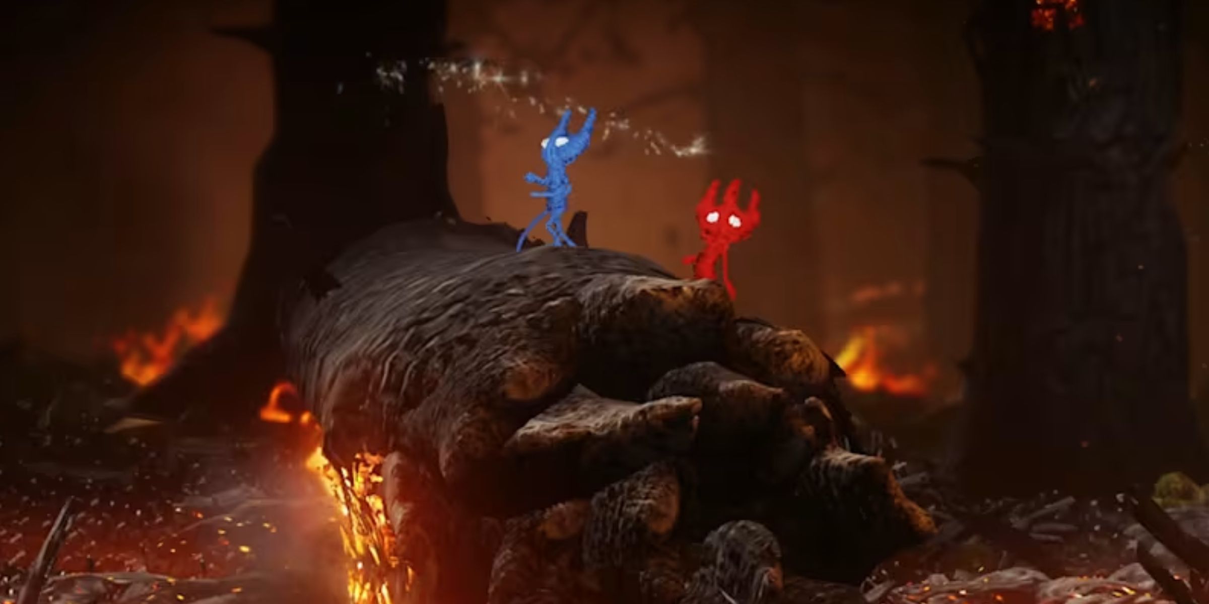 Two Yarnys Ontop Of A Flaming Log In Unravel Two.