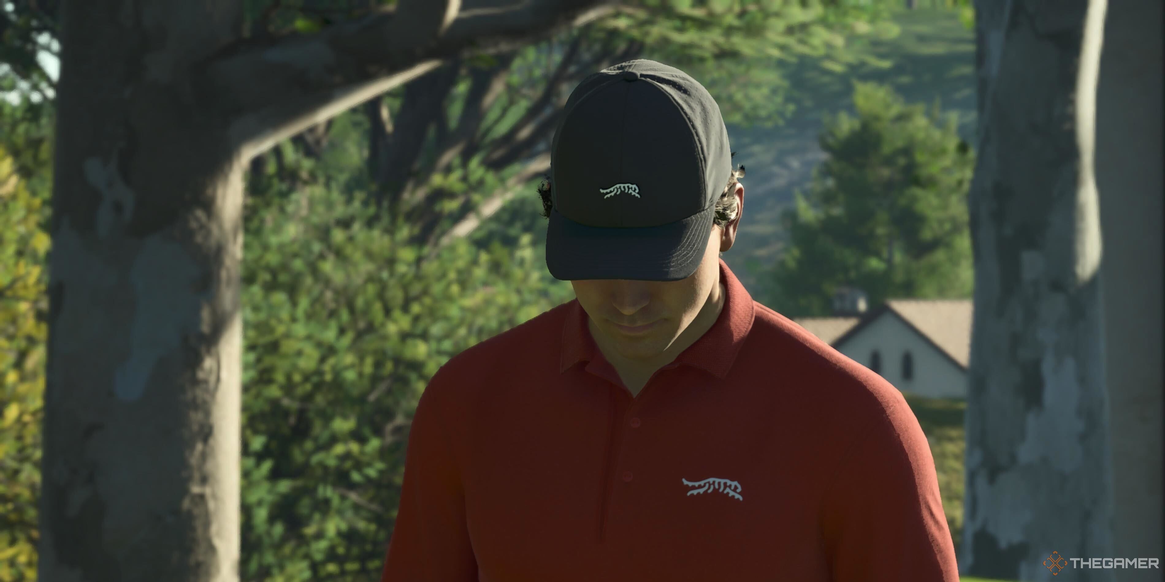 A player with a hat with his head down in PGA Tour 2K25.