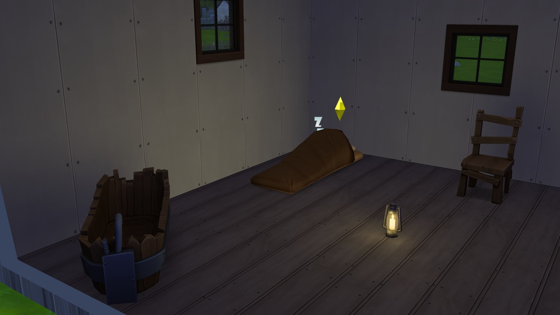 The Sims screenshot of a Sim sleeping on a hay mattress in a sparsely furnished cottage, with a bathtub, stool, and lamp nearby