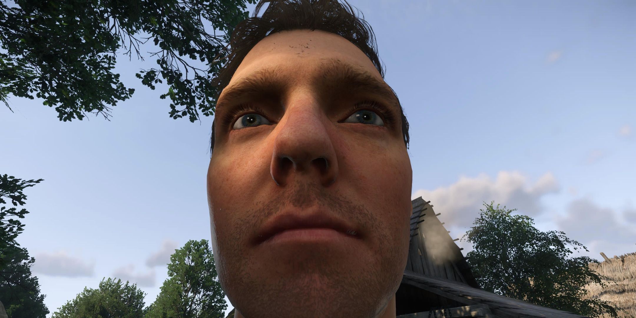 A close-up of Henry's face in Kingdom Come: Deliverance 2.