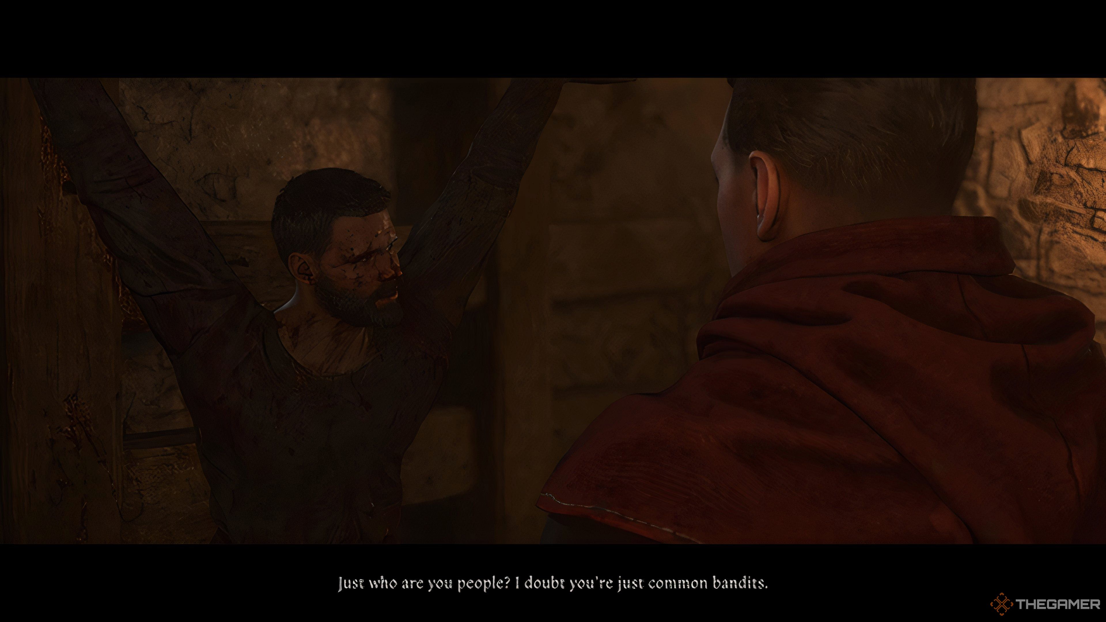 Henry talking to a prisoner in Kingdom Come: Deliverance 2.