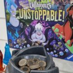 The Disney Villainous Unstoppable box and components on a shelf