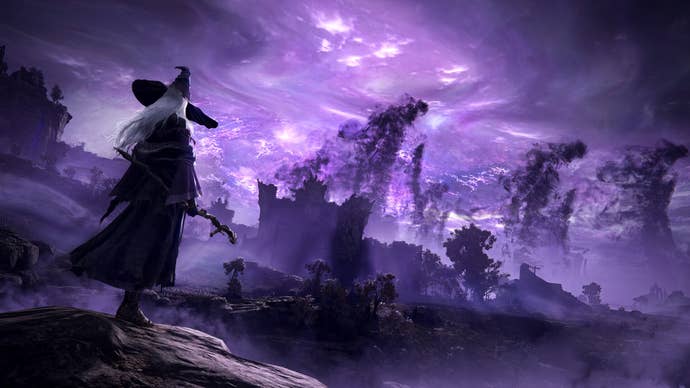 A character wielding a staff, looking very mage-like, can be seen standing on a cliff-edge overlooking their surroundings in Elden Ring Nightreign