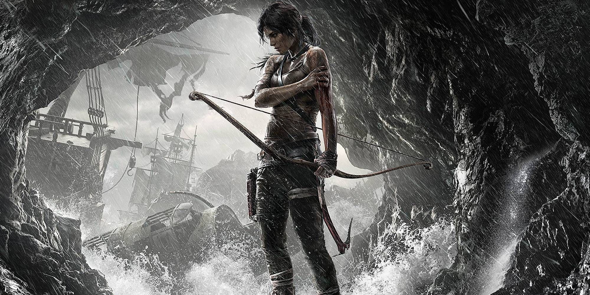 Lara Croft poses in a cavern in Tomb Raider 2013 main art.