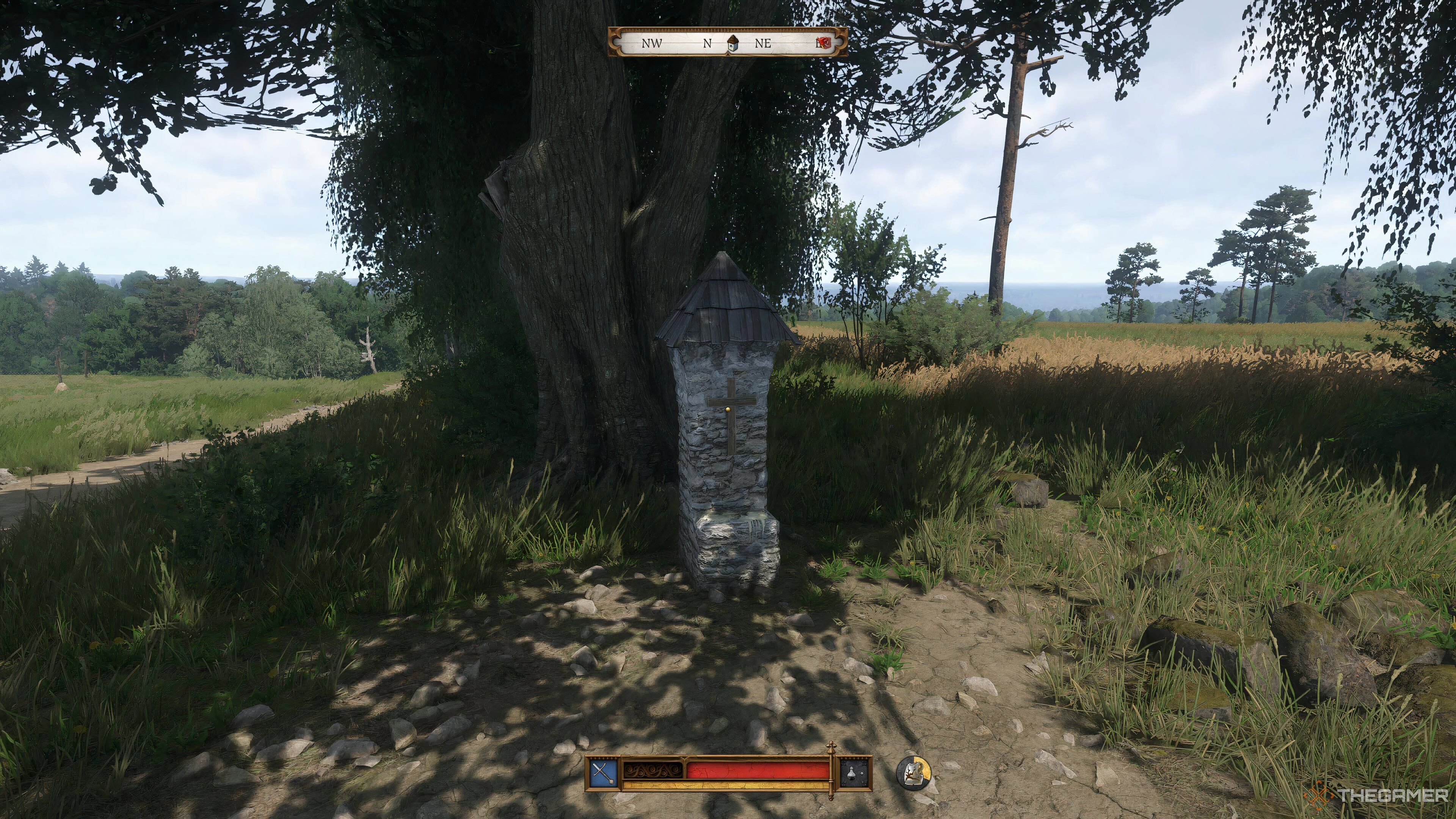 A shrine under a tree in Kingdom Come: Deliverance 2.