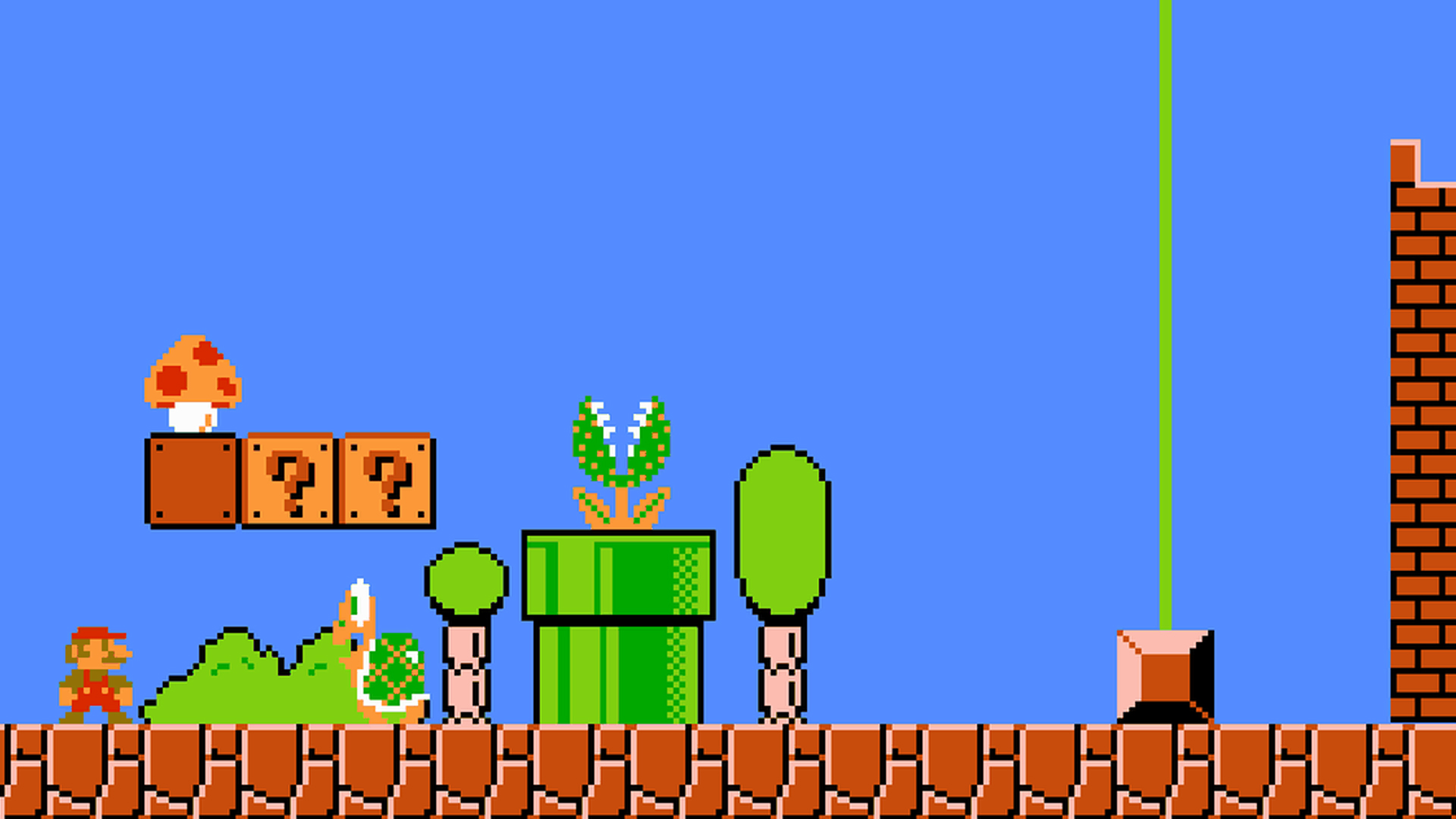 Mario moving through a colourful level in Super Mario Bros.