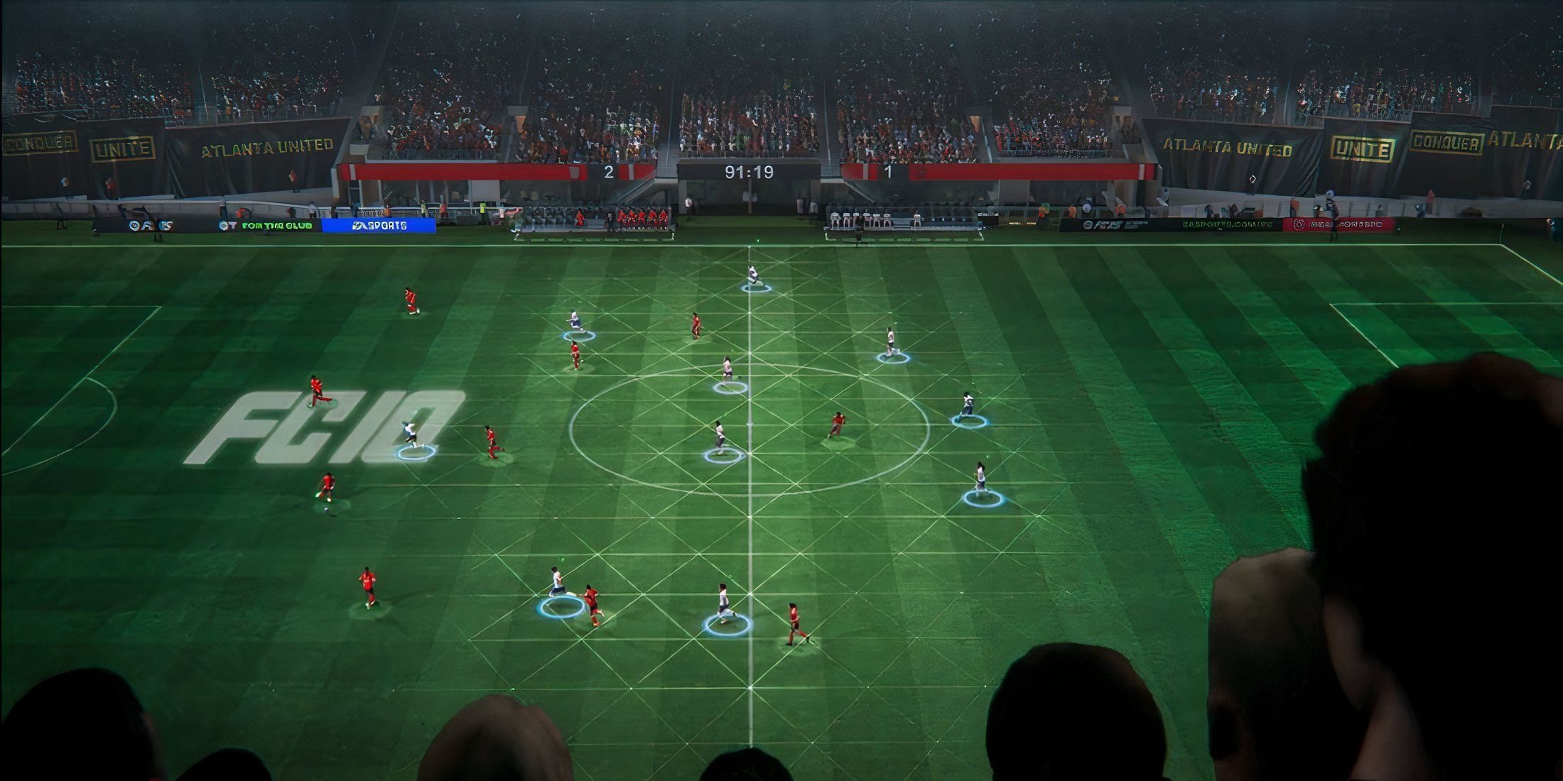 EA Sports FC 25 field with audience in foreground