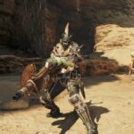 The player standing with the Heavy Bowgun equipped in front of the practice dummy.