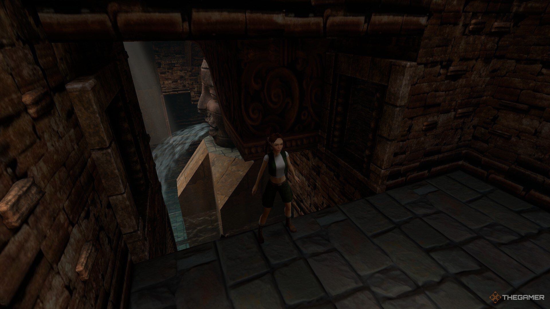 Lara Croft atop a raised platform in Tomb Raider: The Last Revelation.