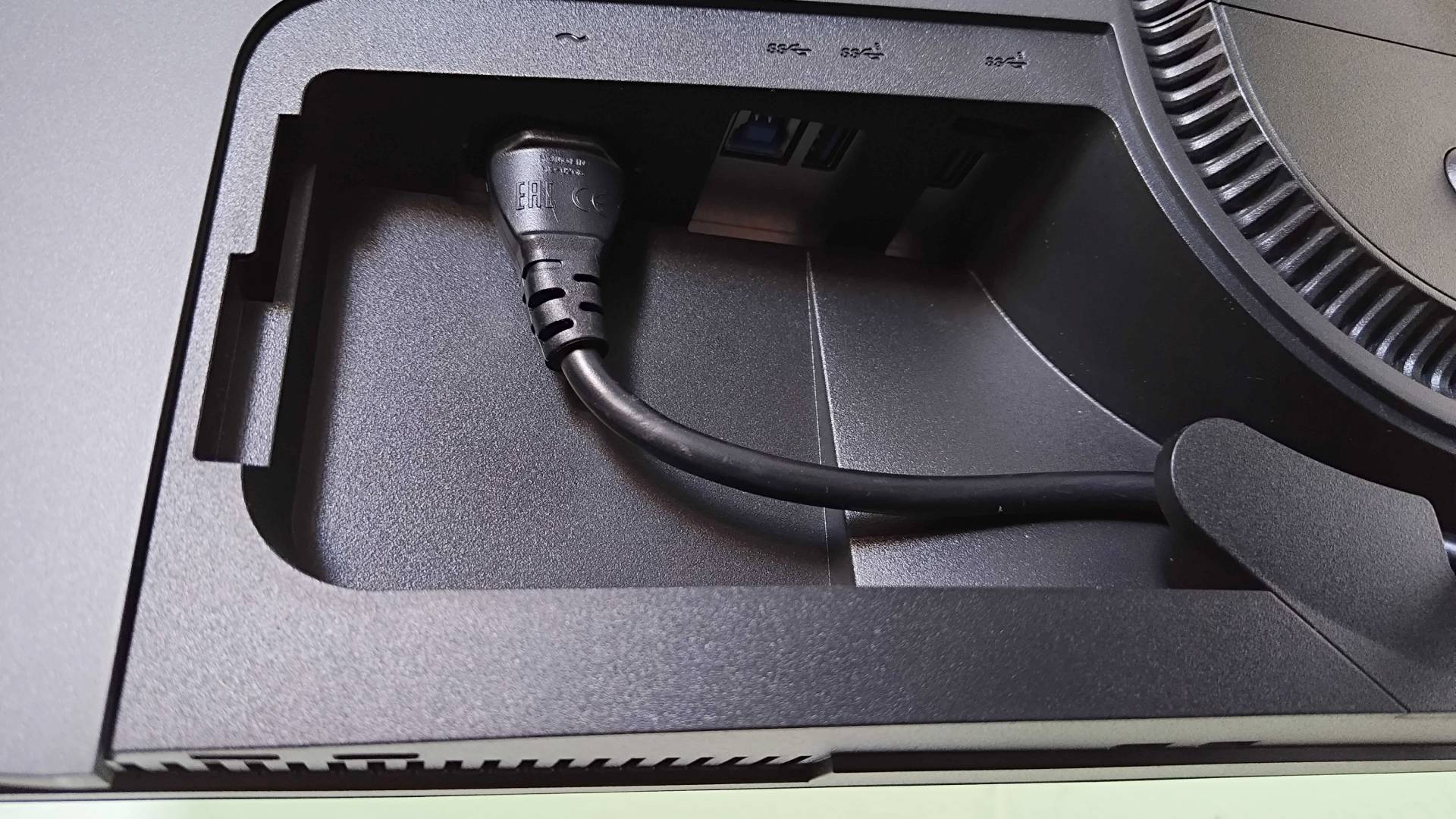 Close up of Alienware AW2725DF monitor power cable and USB ports