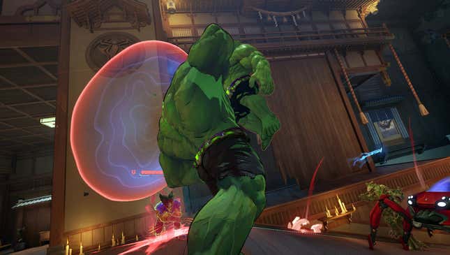 Monster Hulk lifts a smaller Hero Hulk enemy while their teammates watch.