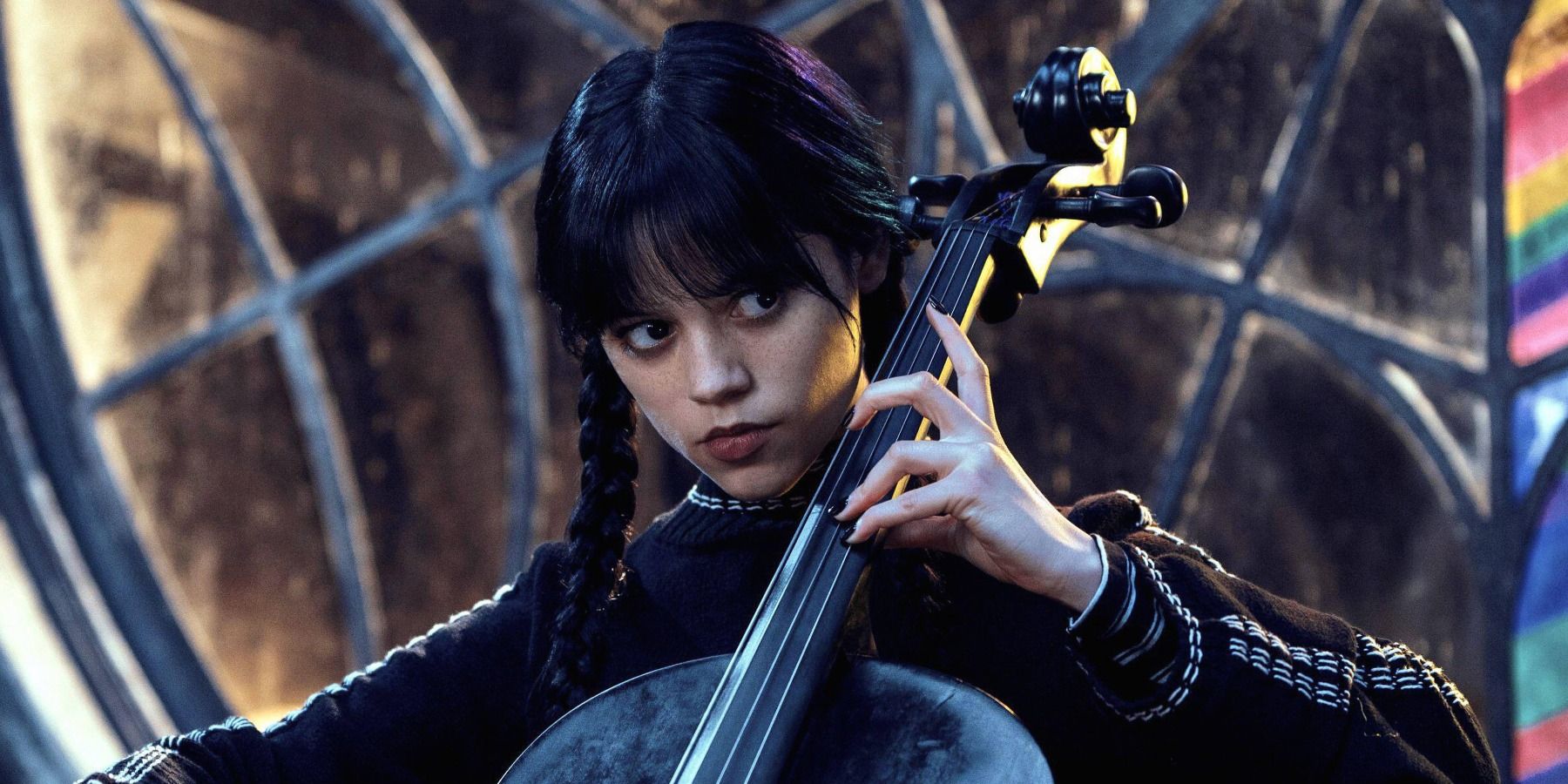 Jenna Ortega playing cello as Wednesday Addams