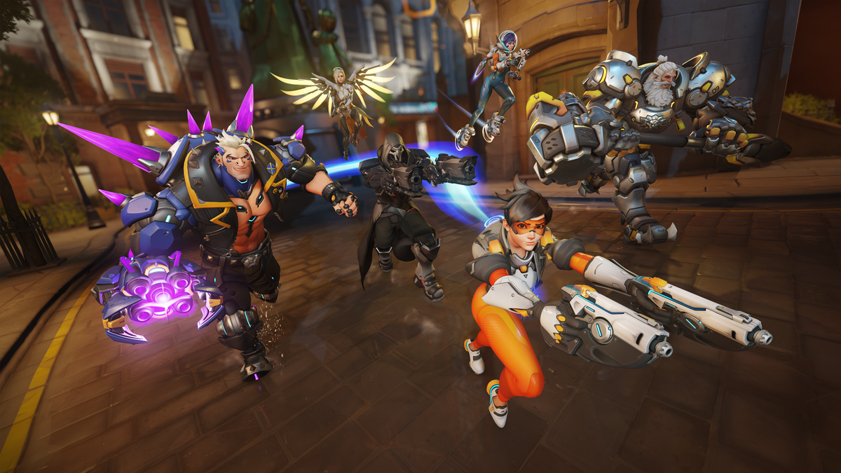 Tracer, Mercy, and other Overwatch 2 heroes charge into battle in a screenshot for Season 15.