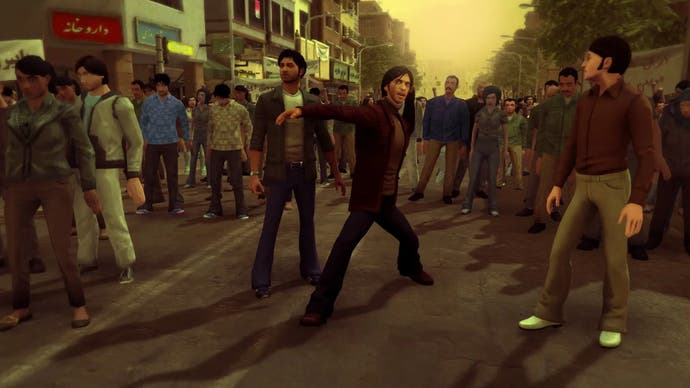 Screenshot of 1979 Revolution showing angry man in middle of a crowd in Iran