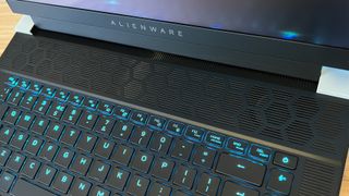 Close up on hexagonal grills inside the Alienware X16 R2 gaming laptop