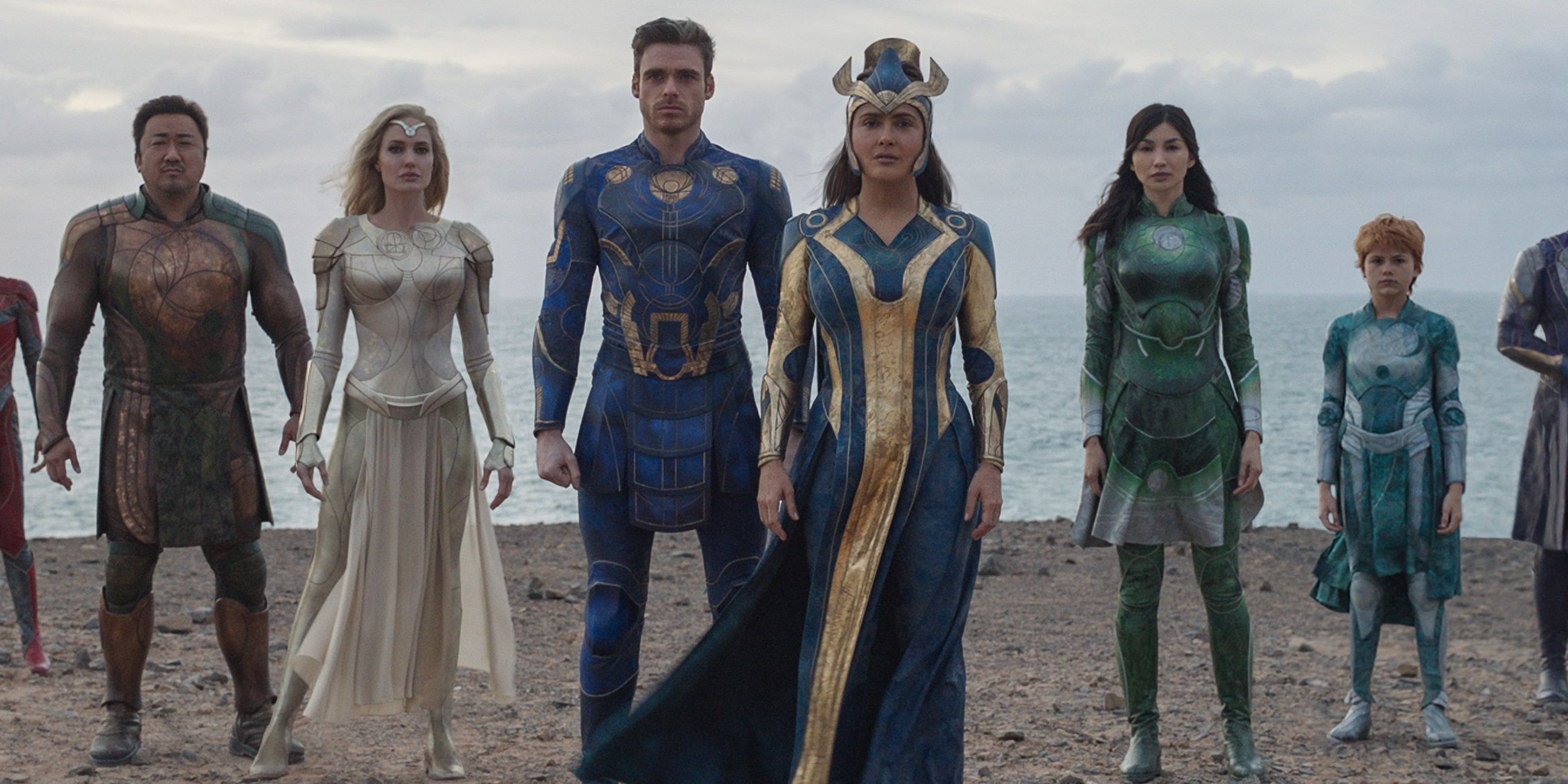 The Eternals standing on a beach in Eternals