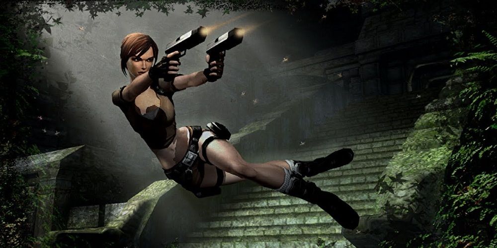 Tomb Raider Legend promo shot of Lara Croft firing pistols while jumping through air.