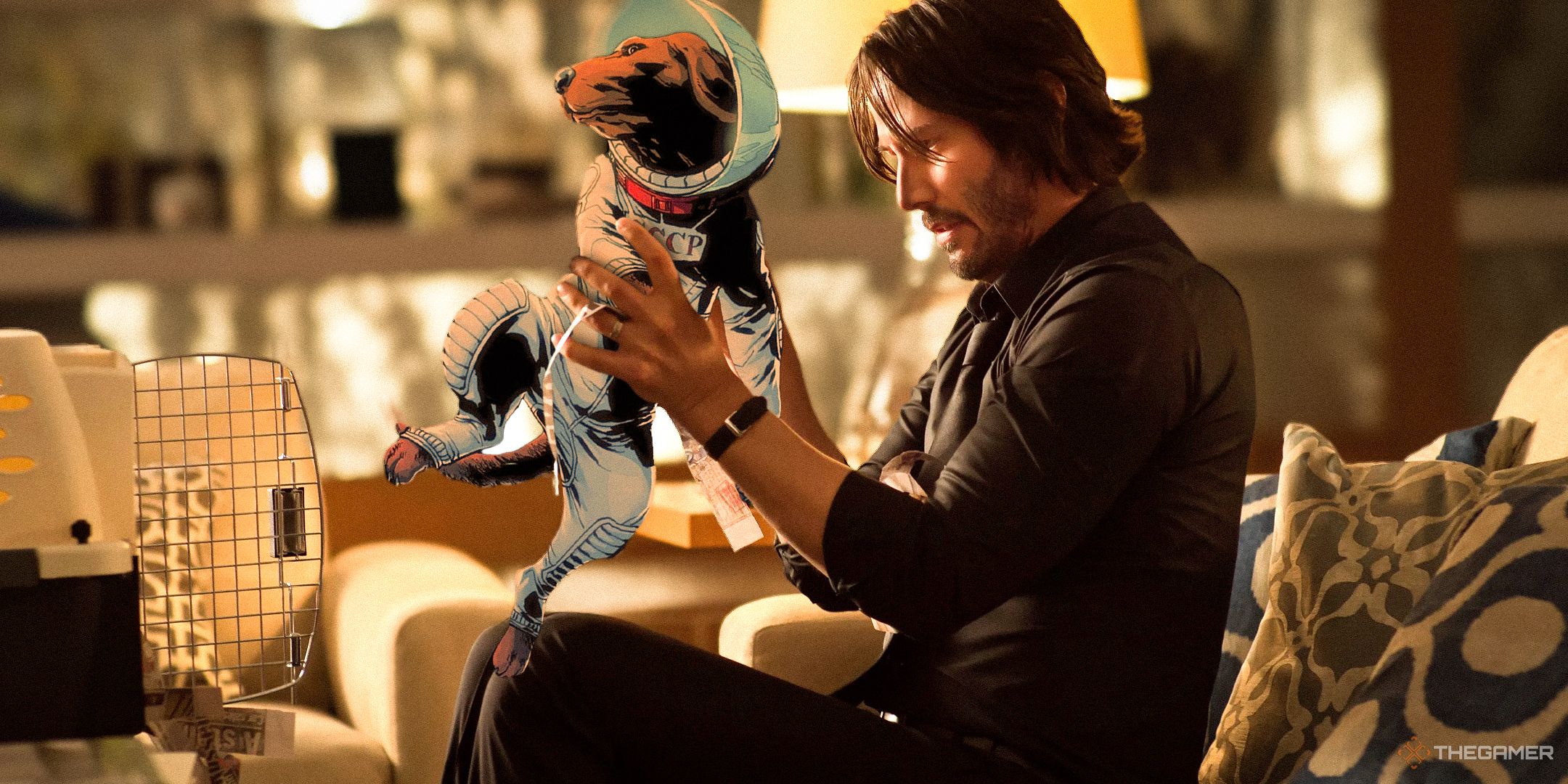 John Wick holding Cosmo the Spacedog.