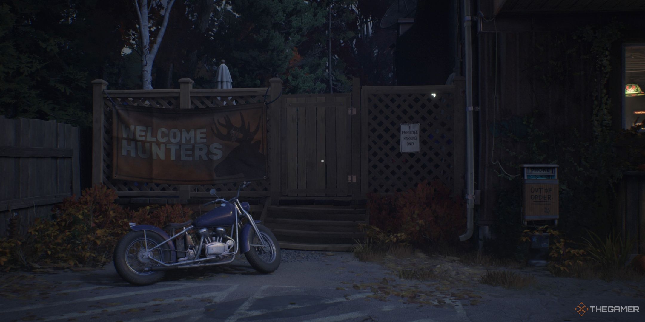 A view of four objects in Lost Records Bloom & Rage parking lot includes a motorcycle, a banner, a payphone, and a white sign.