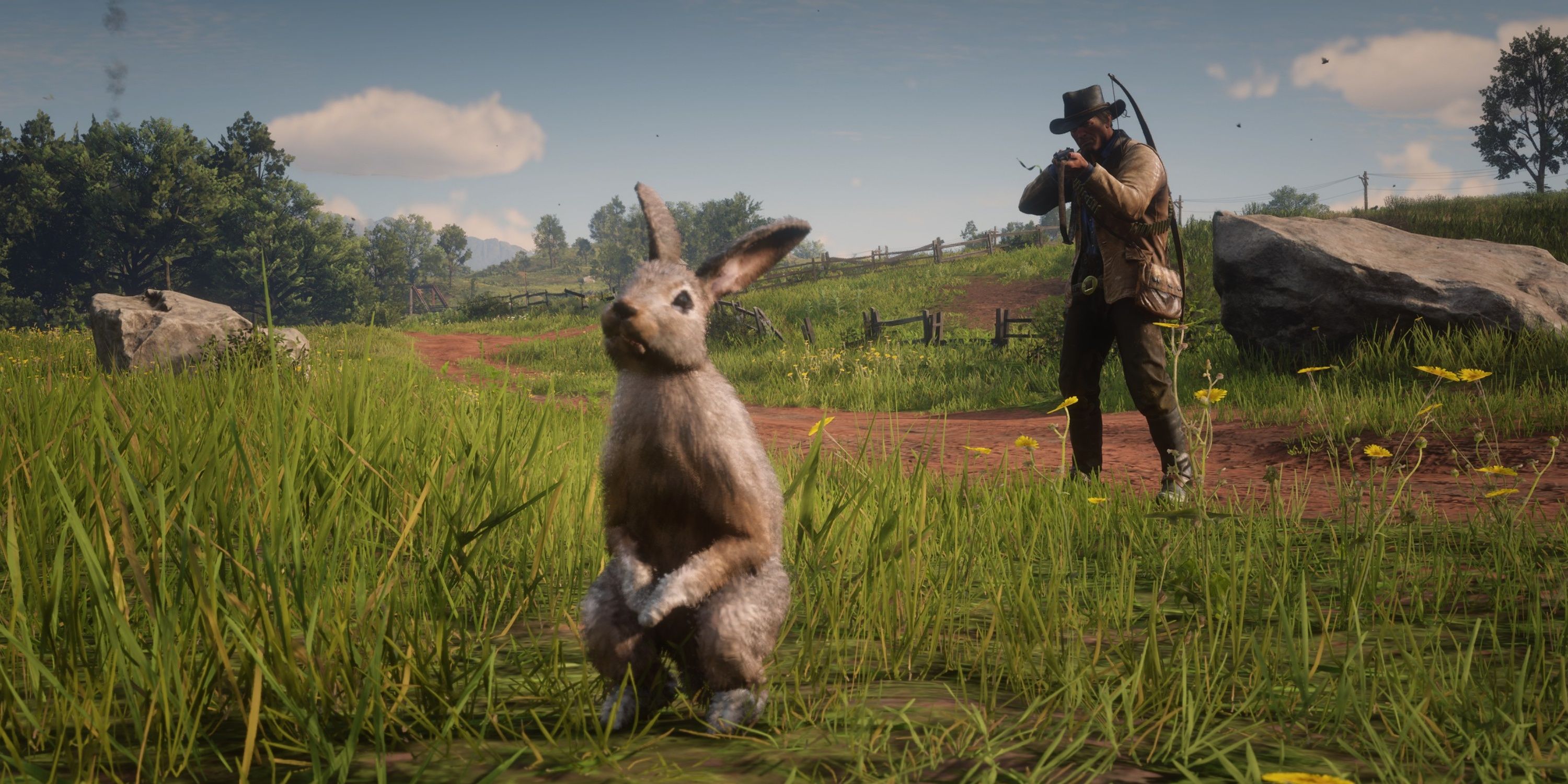 arthur aims a varmint rifle at a rabbit