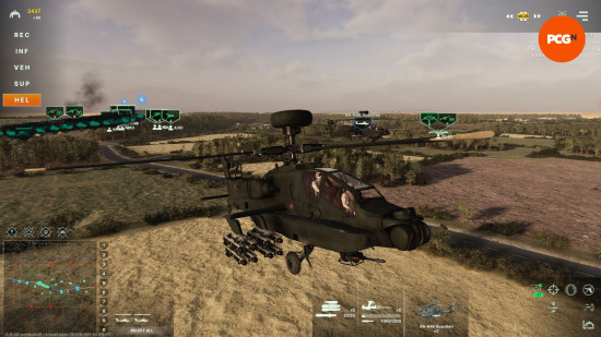 Broken Arrow preview: a close up of the pilots in a modern attack helicopter. Below the helicopter are wheat fields.