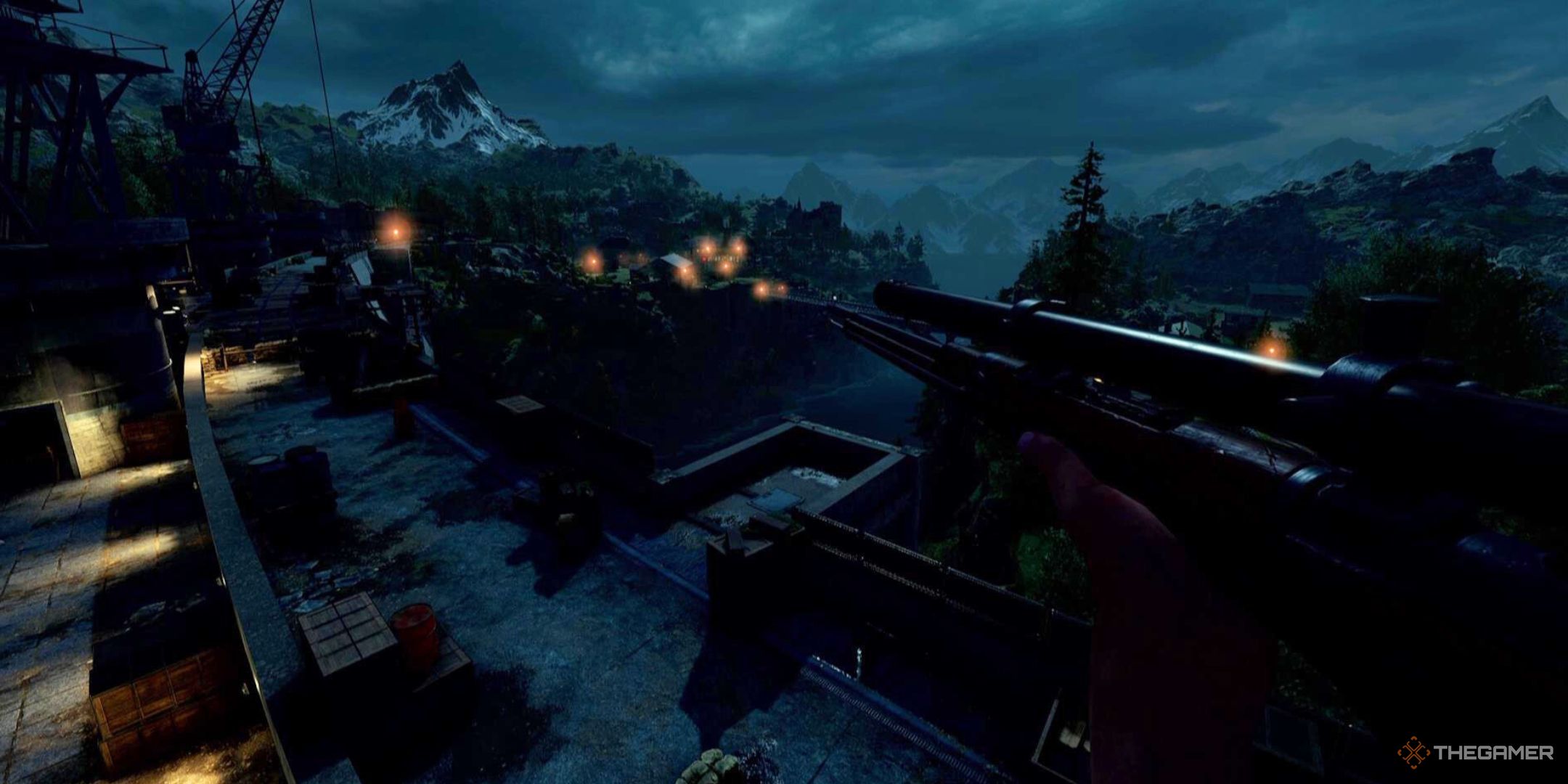 An arm holds a rifle aiming out over a dam lit by the moon at night in Sniper Elite Resistance.