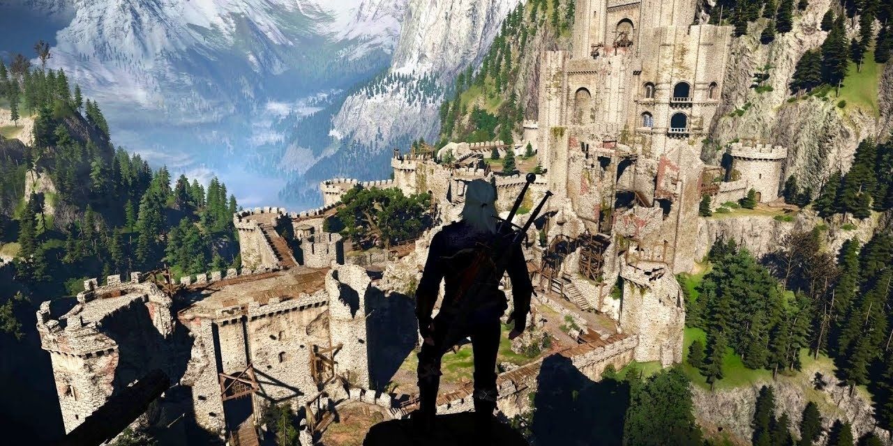 Geralt standing in front of Kaer Morhen