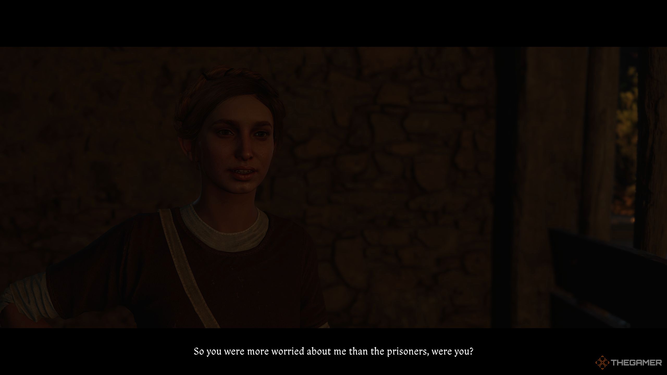 Henry talking to Klara outside of a prison cell.