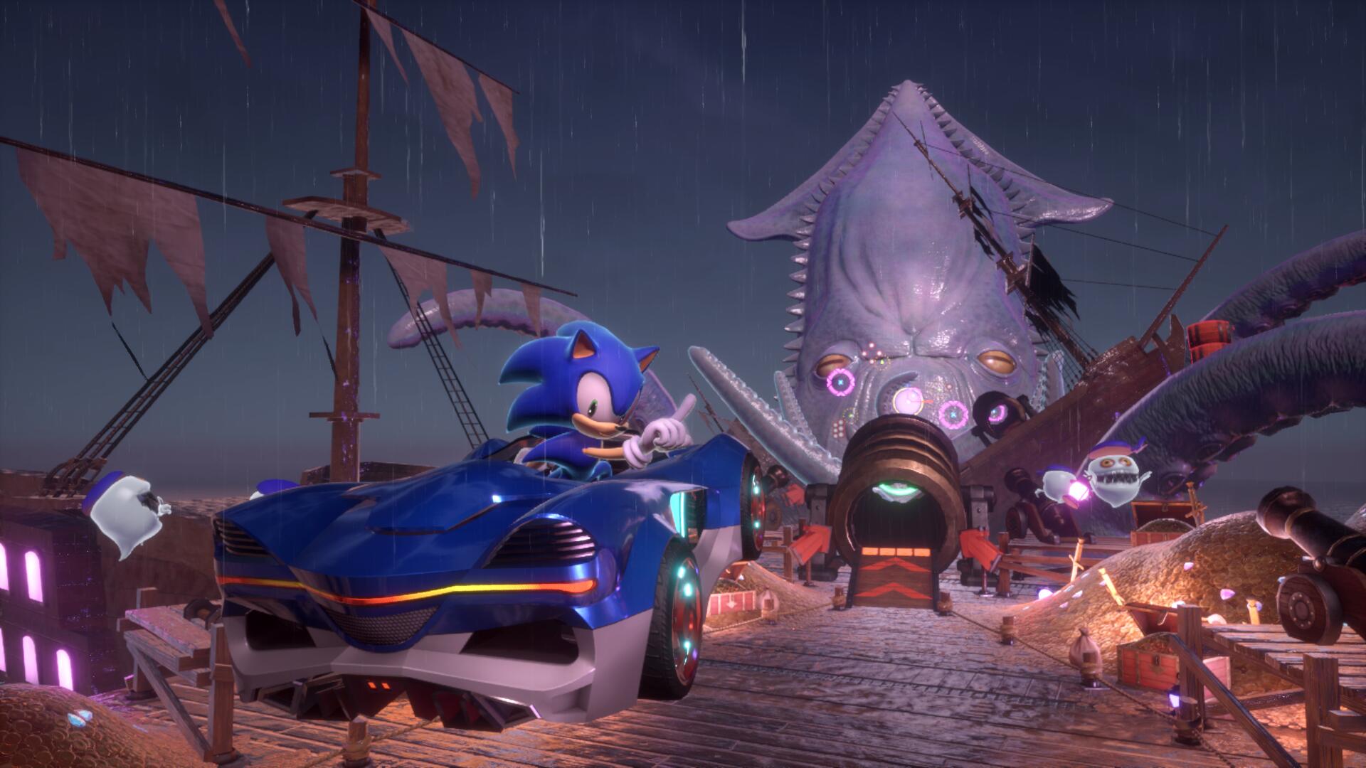 Sonic wags his finger at the camera in Sonic Racing: CrossWorlds as he drives towards a giant squid in the Kraken Bay track